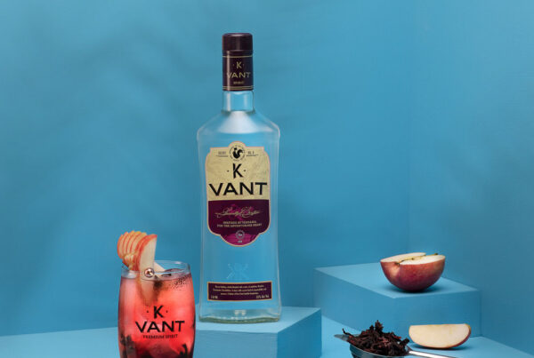 KVant 750ml photographed with a cocktail