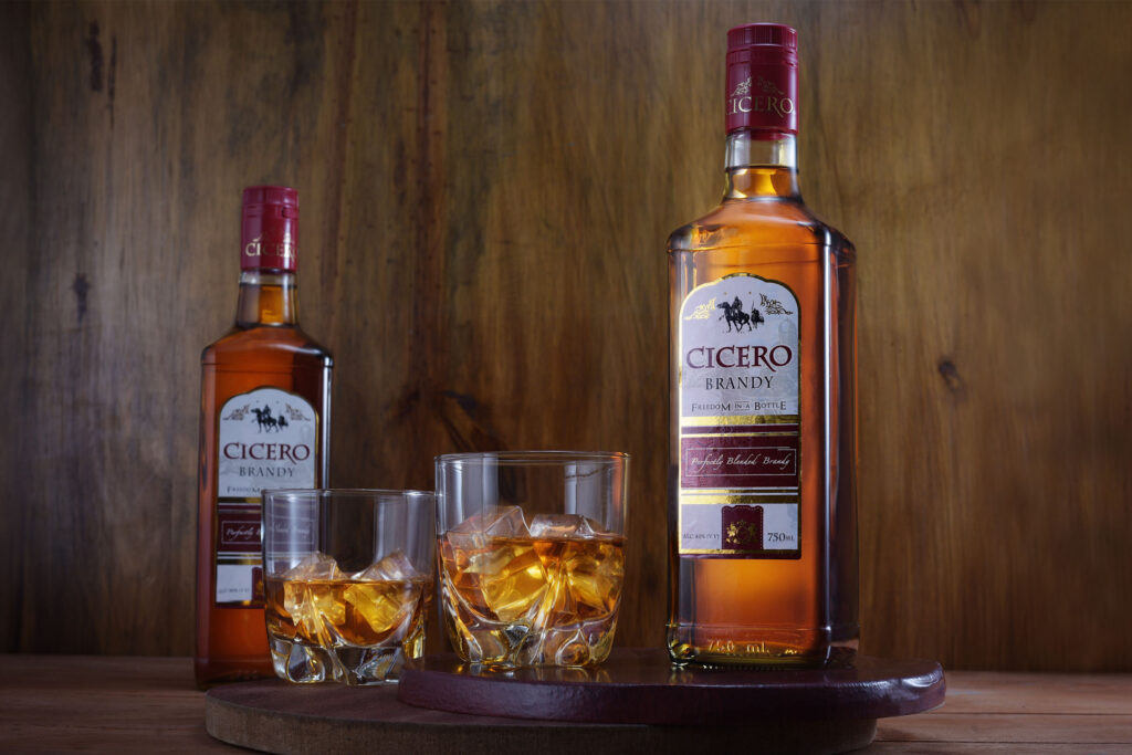 Cicero brandy 750ml -with some brandy in a glass